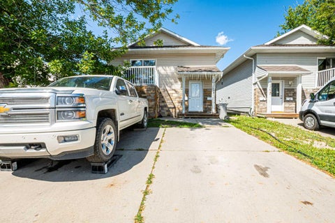 Photo of 10028 104 Avenue #A&B, Grande Prairie, AB T8V 1E6 (MLS # A2336151)