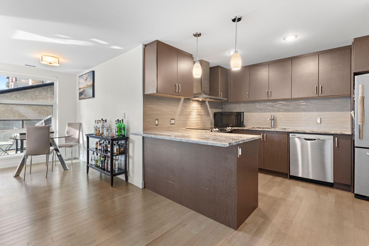 303 13 Avenue SW 311