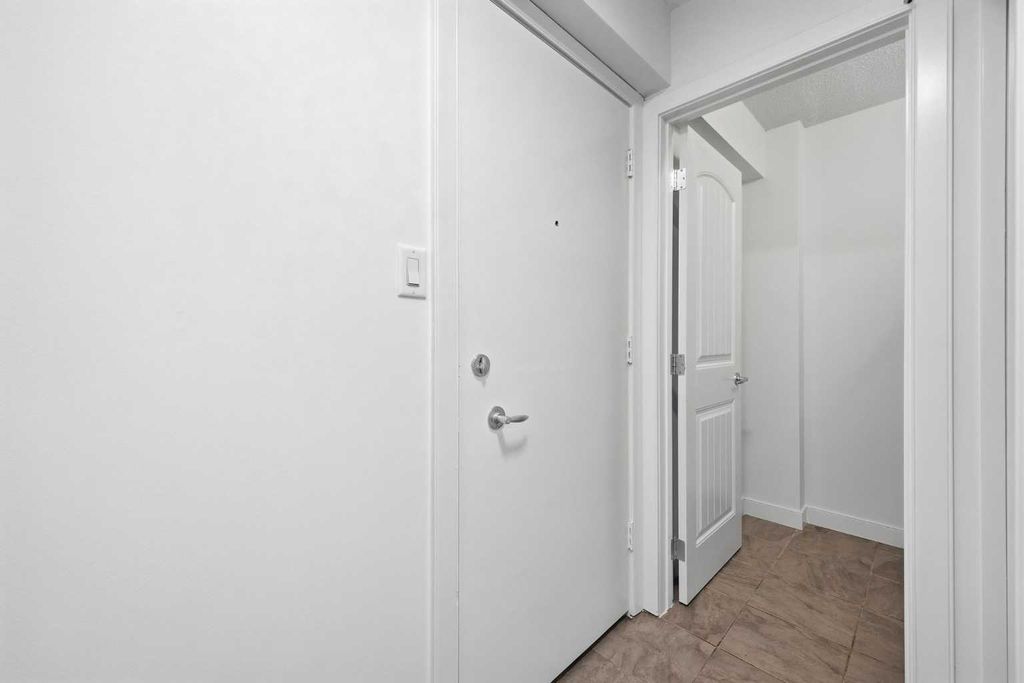 Photo of 620 15 Avenue SW #402, Calgary, AB T2R 0R5 (MLS # A2300419)