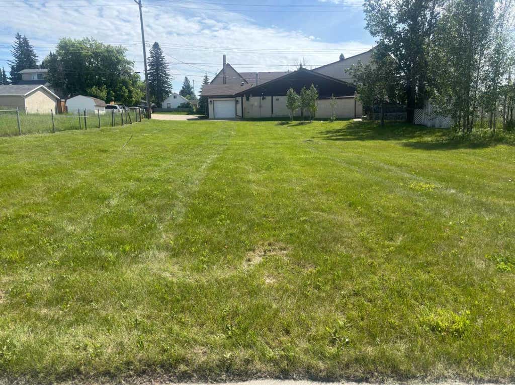 Photo of 49 Street #4807 4809, Rocky Mountain House, AB T4T 1A3 (MLS # A2034654)