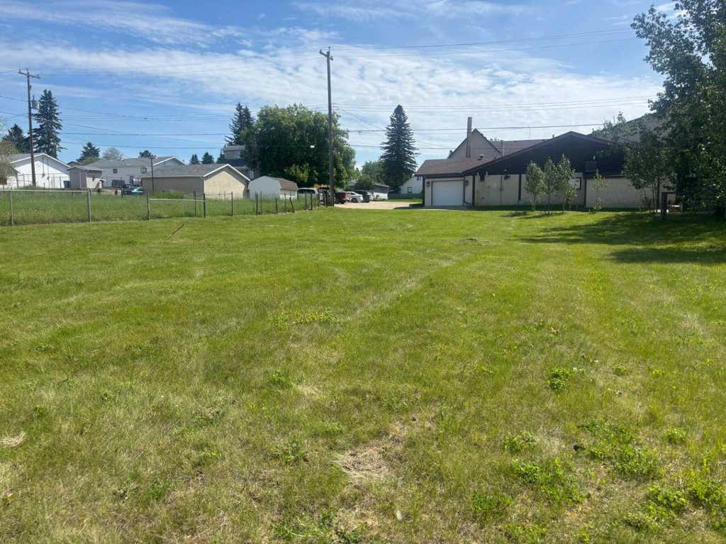 Photo of 49 Street #4807 4809, Rocky Mountain House, AB T4T 1A3 (MLS # A2034654)