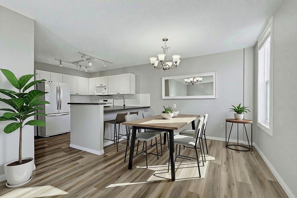 Photo of 1328 13 Avenue SW #302, Calgary, AB T3C 0T3 (MLS # A2349655)