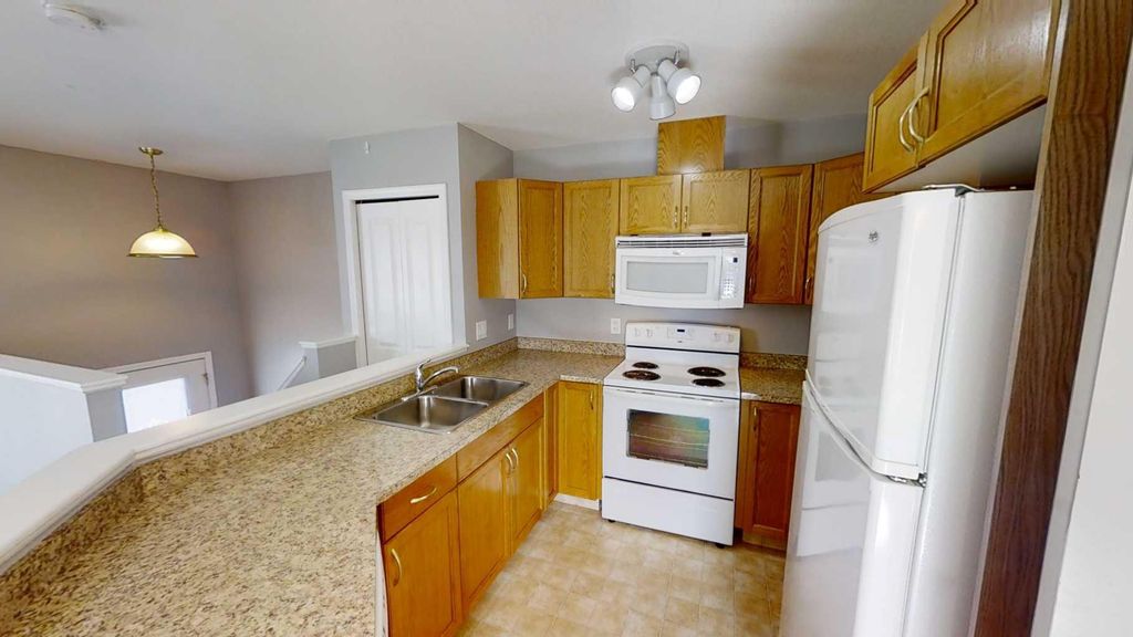 Photo of 9804 99 Street #C, Wembley, AB T0H 3S0 (MLS # A2296706)