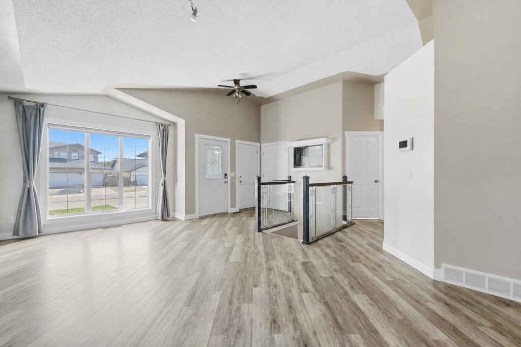 Photo of 206 Highwood Village Place NW, High River, AB T1V 1V9 (MLS # A2340365)