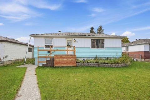 Photo of 7711 39 Avenue NW, Calgary, AB T3B 1X4 (MLS # A2345518)