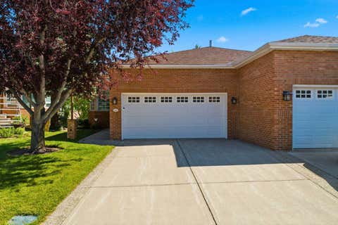 Photo of 60 Prominence Point SW, Calgary, AB T3H 3E8 (MLS # A2339682)