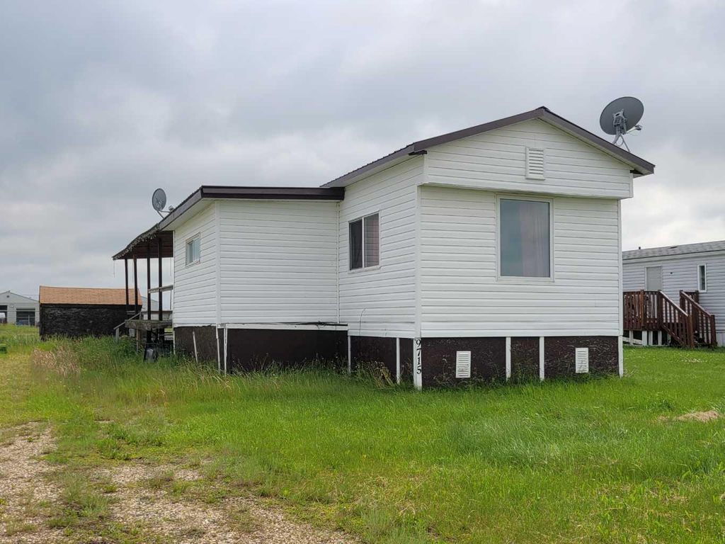 Photo of 9715 102 Street, Nampa, AB T0H 2R0 (MLS # A2308276)