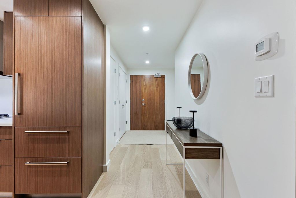Photo of 128 Waterfront Court SW #104, Calgary, AB T2P 1K9 (MLS # A2264821)