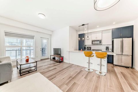 Photo of 44 Spring Creek Common SW, Calgary, AB T2E 6E2 (MLS # A2298515)