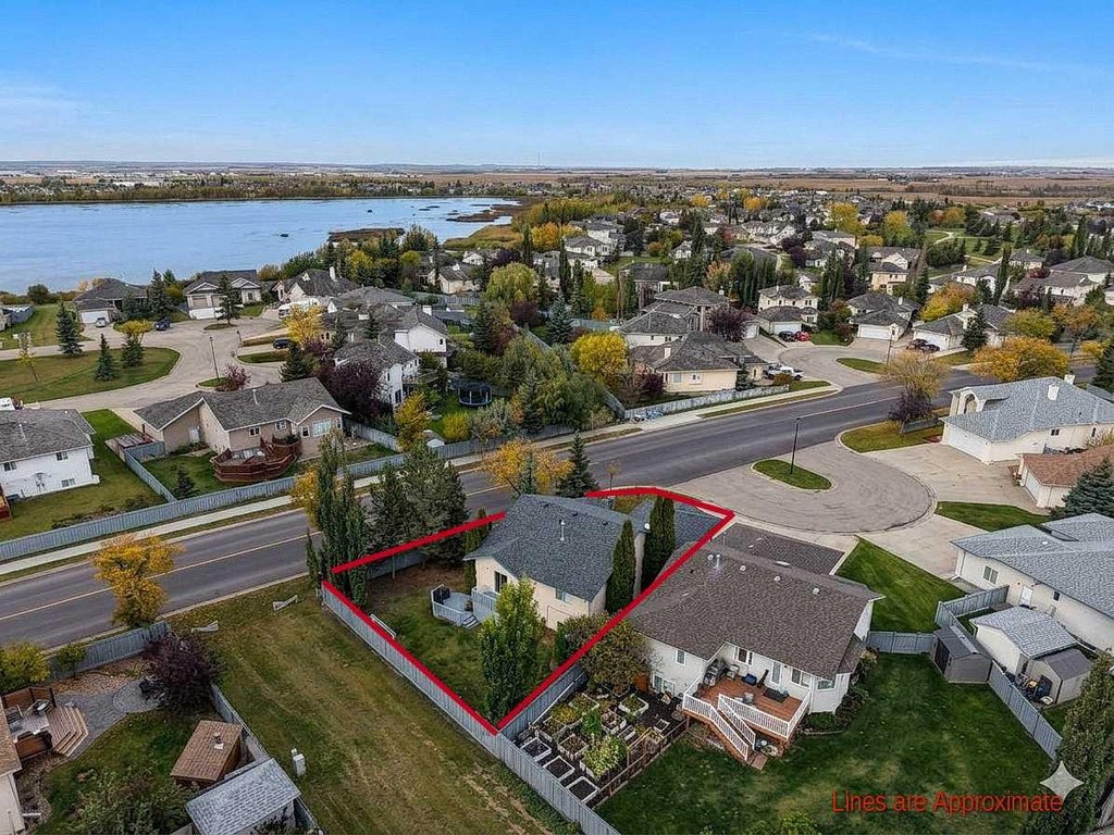 Photo of 9117 Crystal Lake Drive, Grande Prairie, AB T8X 1J3 (MLS # A2348943)