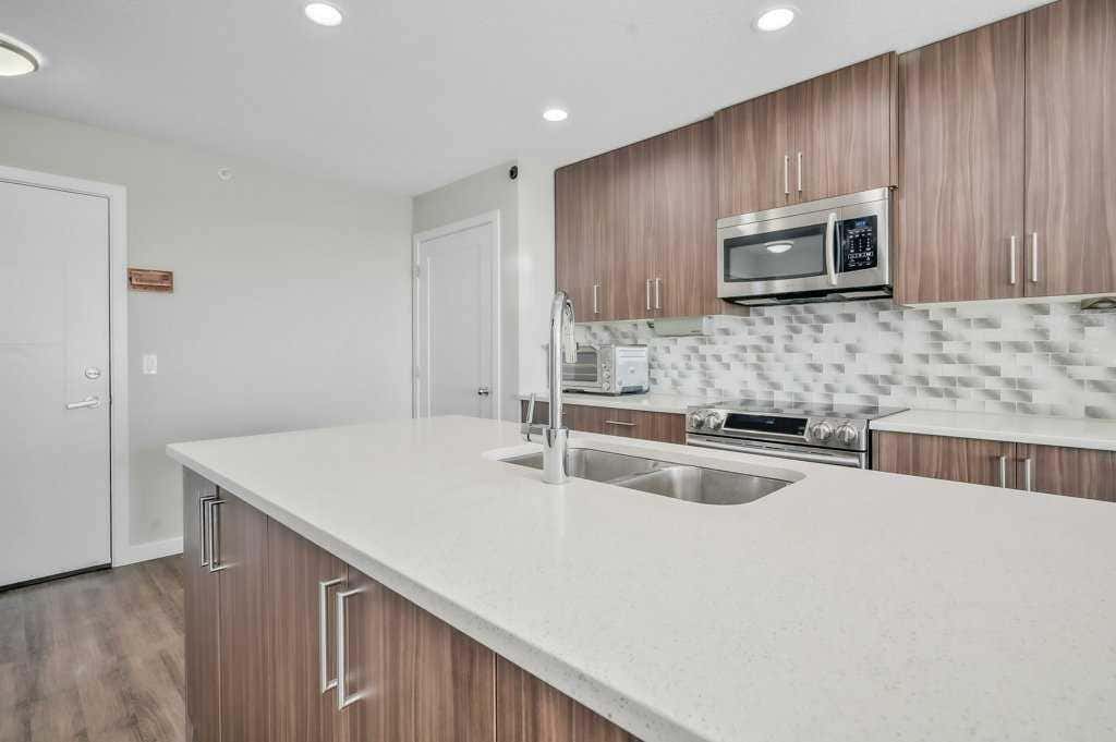 Photo of 8531 8A Avenue SW #402, Calgary, AB T3H 1V4 (MLS # A2296030)
