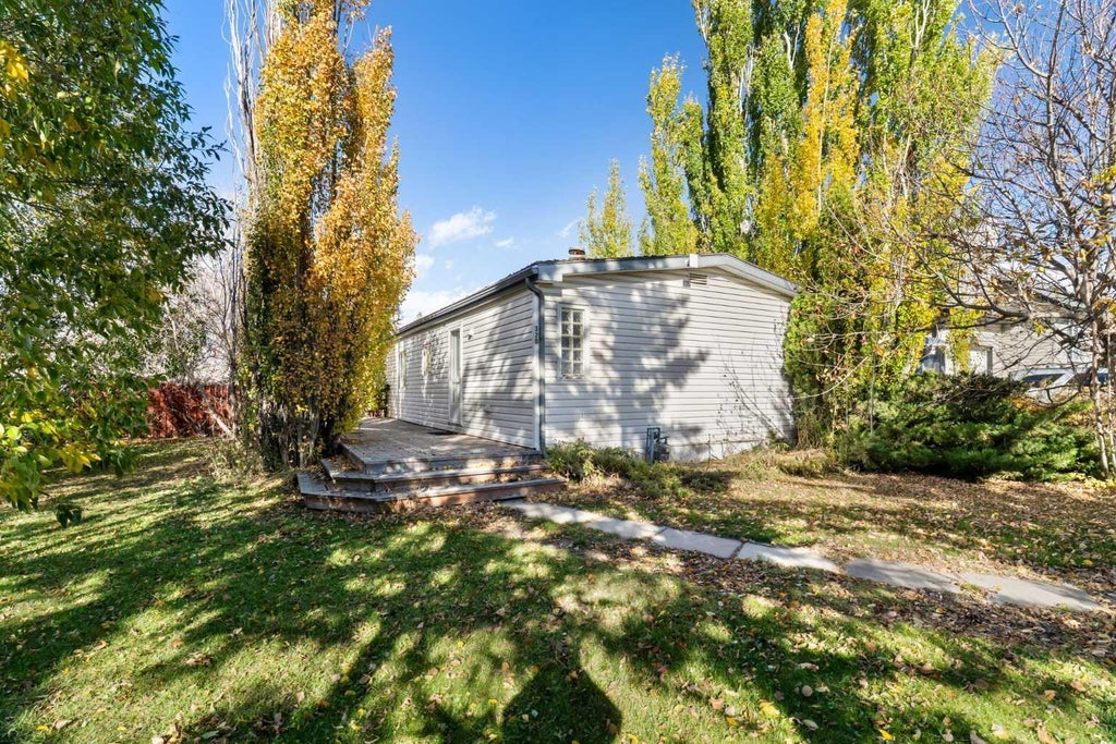 Photo of 320 Railway Avenue NW, Langdon, AB T0J 1X2 (MLS # A2351772)