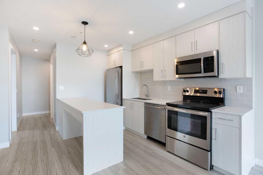 Photo of 1734 11 Avenue SW #103, Calgary, AB T3C 0N4 (MLS # A2281700)
