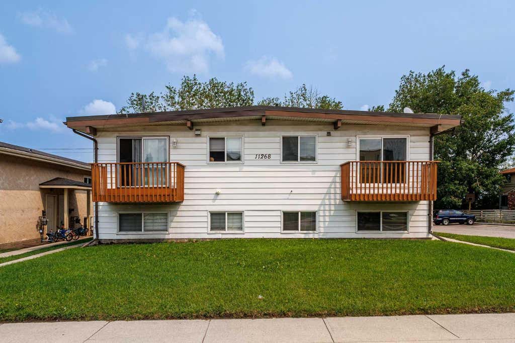 Photo of 11268 6 St SW, Calgary, AB T2W 1V9 (MLS # A2335391)