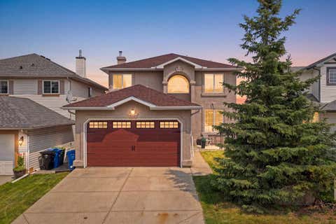 Photo of 360 Hidden Ranch Circle NW, Calgary, AB T3A 5R3 (MLS # A2317952)