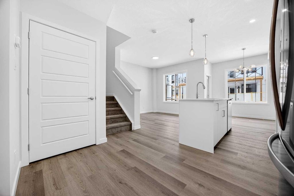 Photo of 58 Creekside Way SW, Calgary, AB T2X 6E2 (MLS # A2292907)