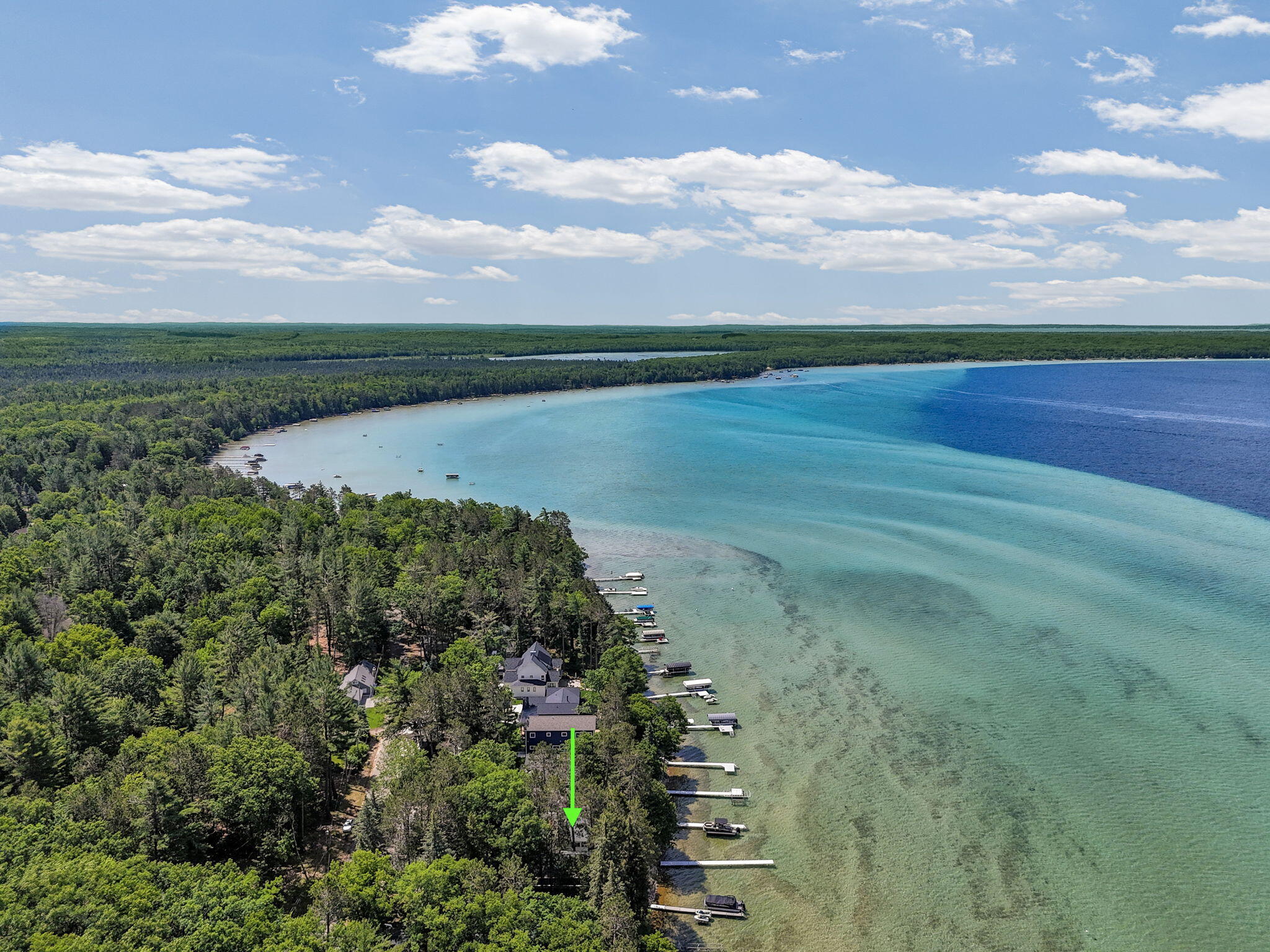 Enjoy breathtaking sunsets from this Higgins Lake waterfront home loca – image 55