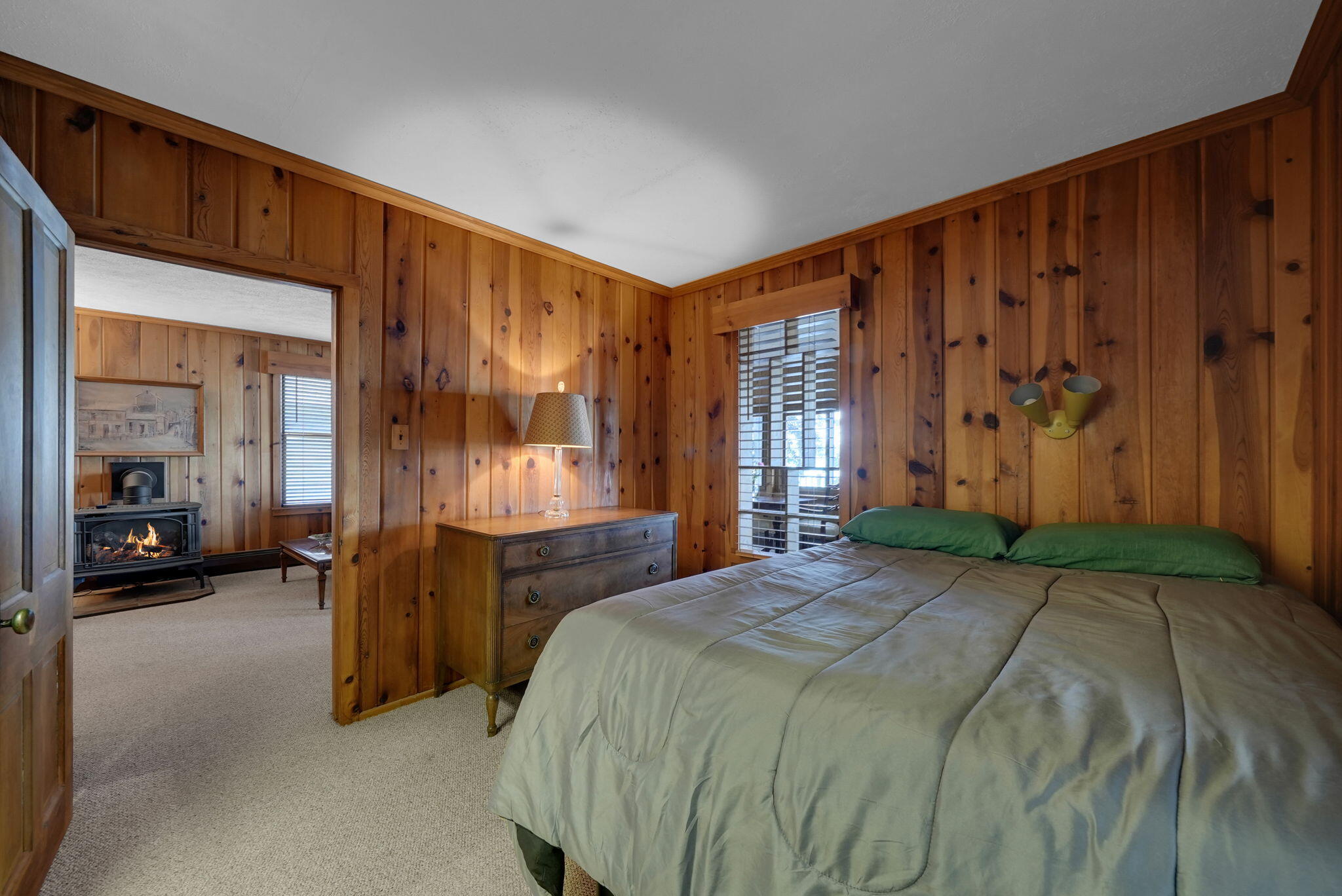 Enjoy breathtaking sunsets from this Higgins Lake waterfront home loca – image 21