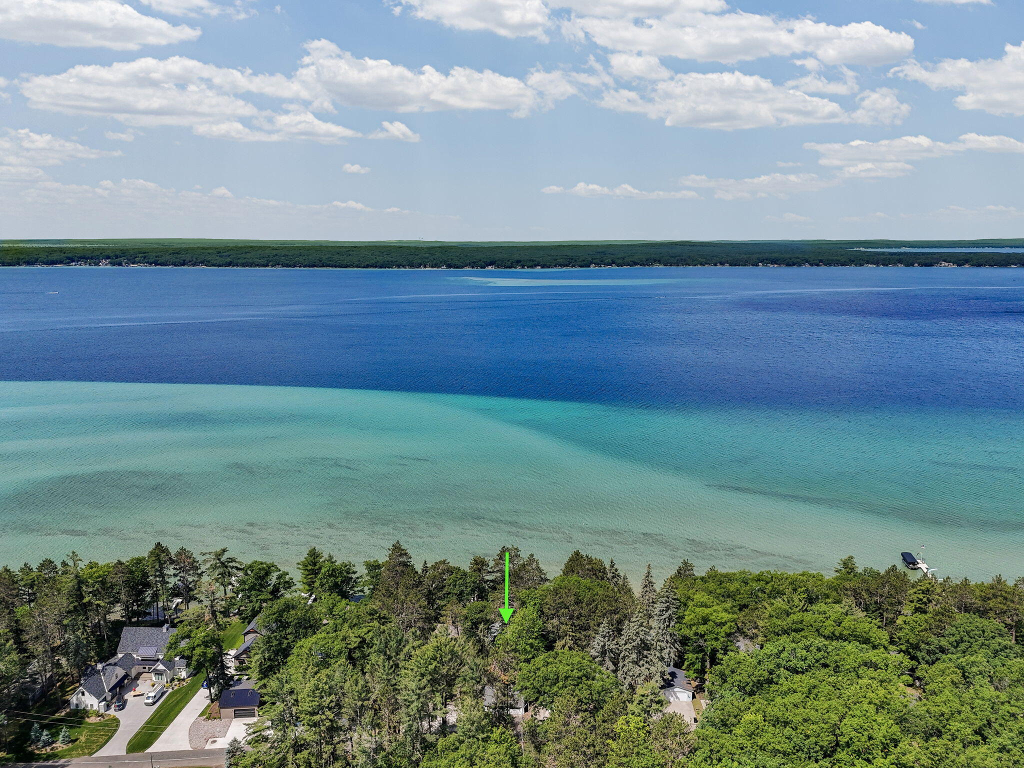 Enjoy breathtaking sunsets from this Higgins Lake waterfront home loca – image 54