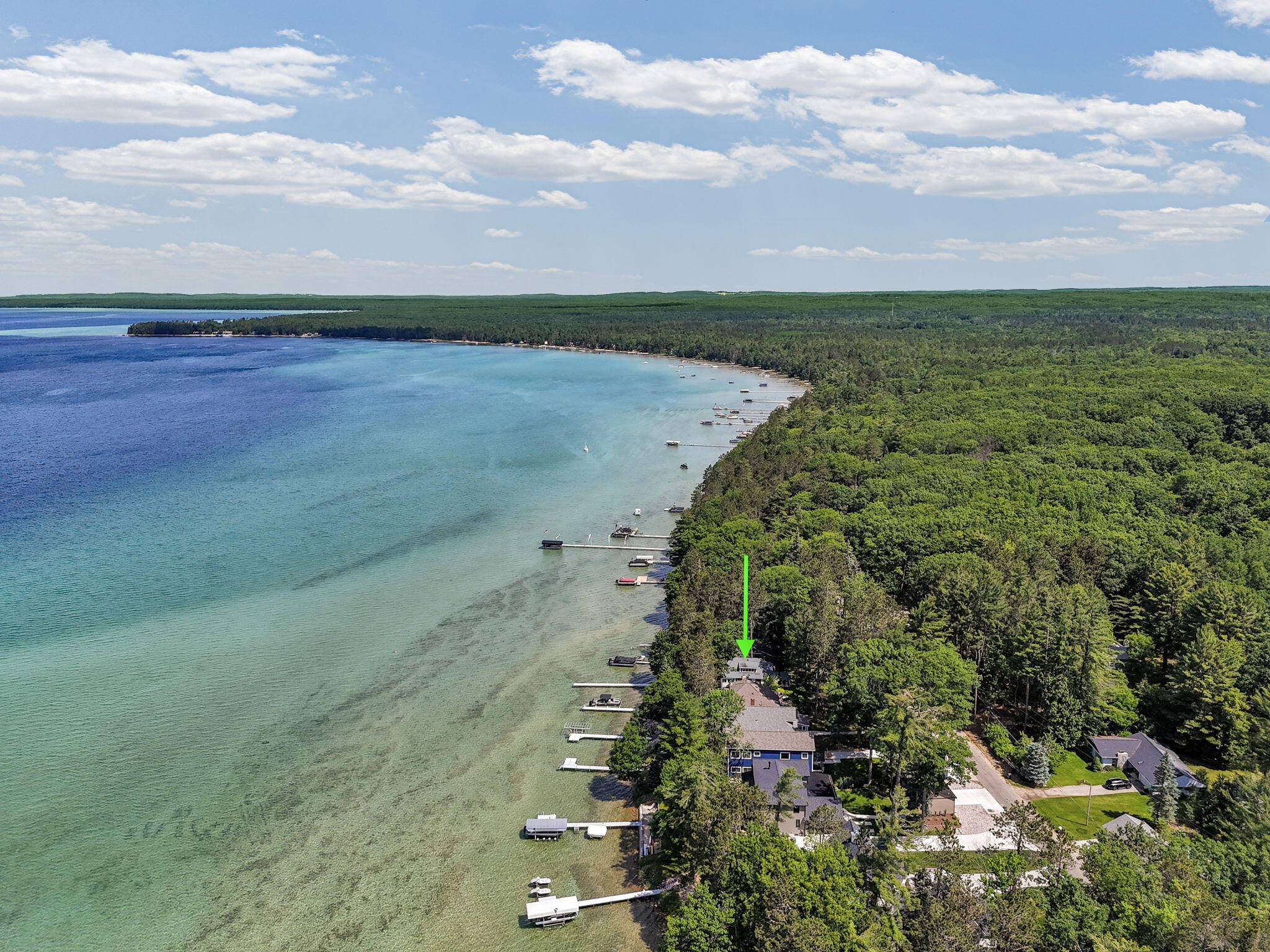 Enjoy breathtaking sunsets from this Higgins Lake waterfront home loca – image 7