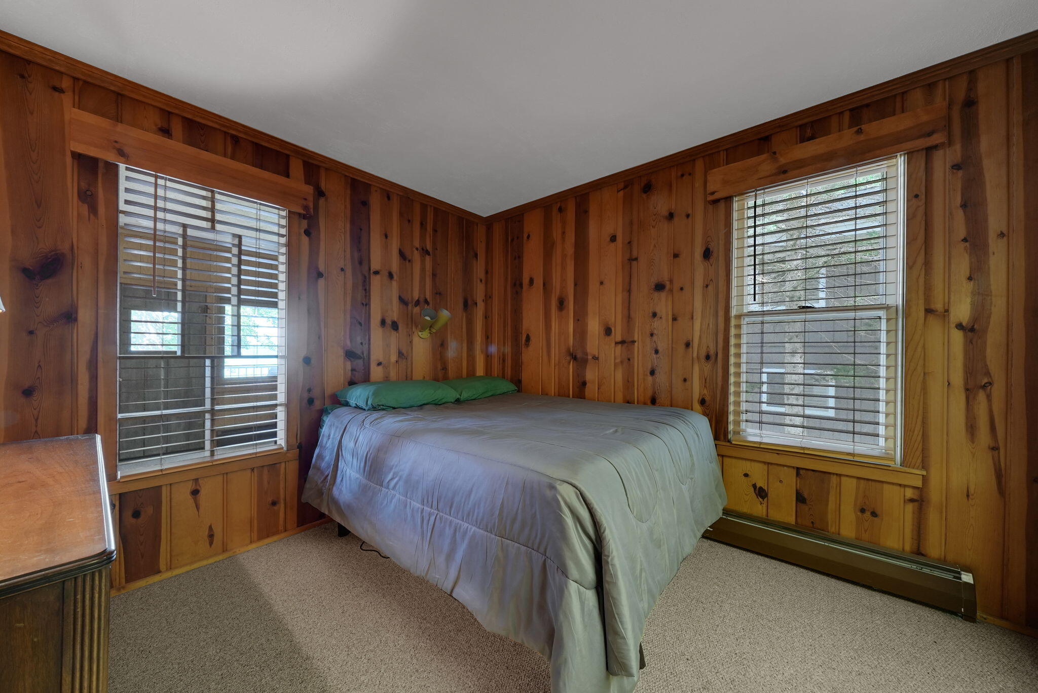 Enjoy breathtaking sunsets from this Higgins Lake waterfront home loca – image 19