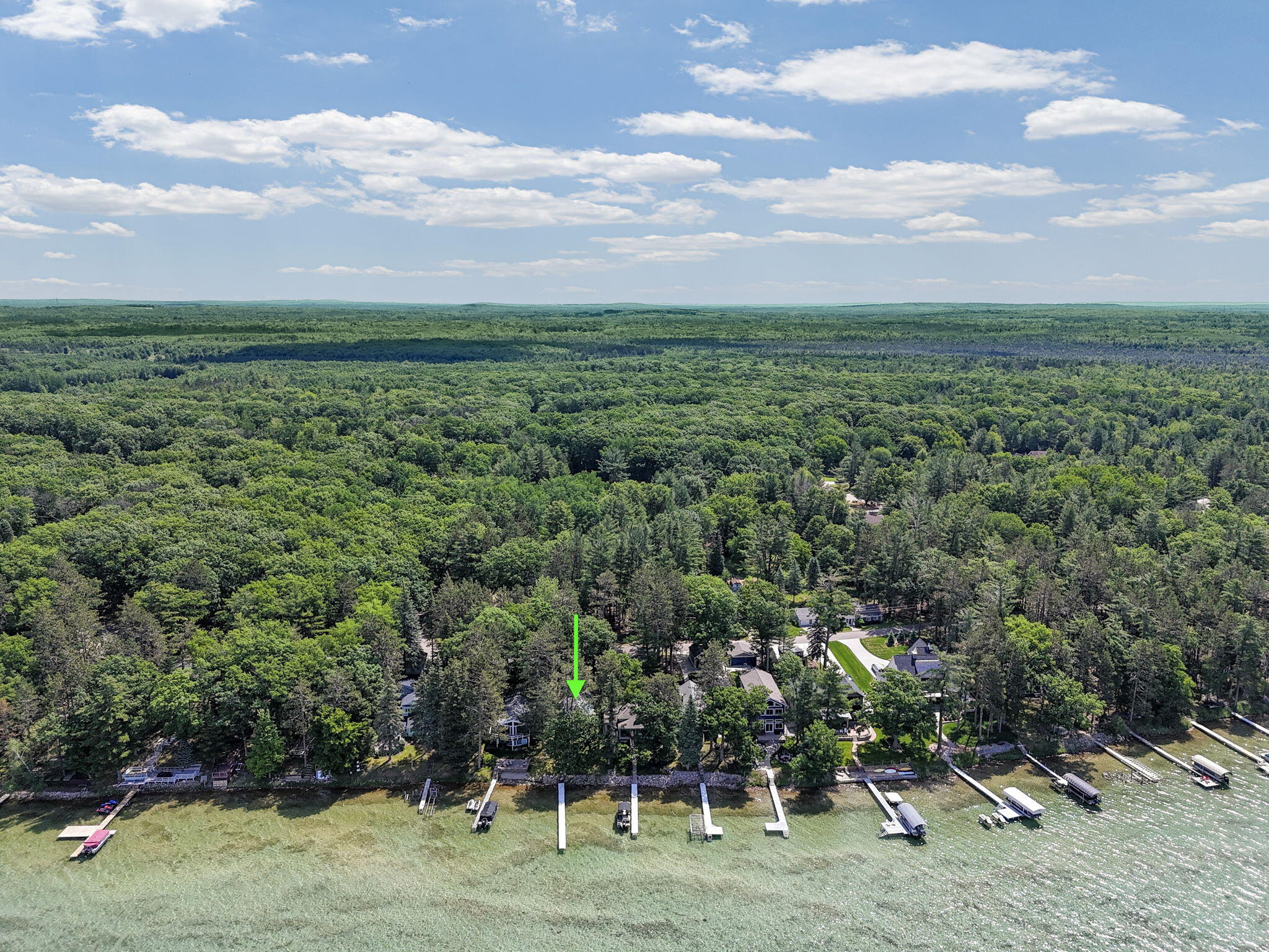Enjoy breathtaking sunsets from this Higgins Lake waterfront home loca – image 8