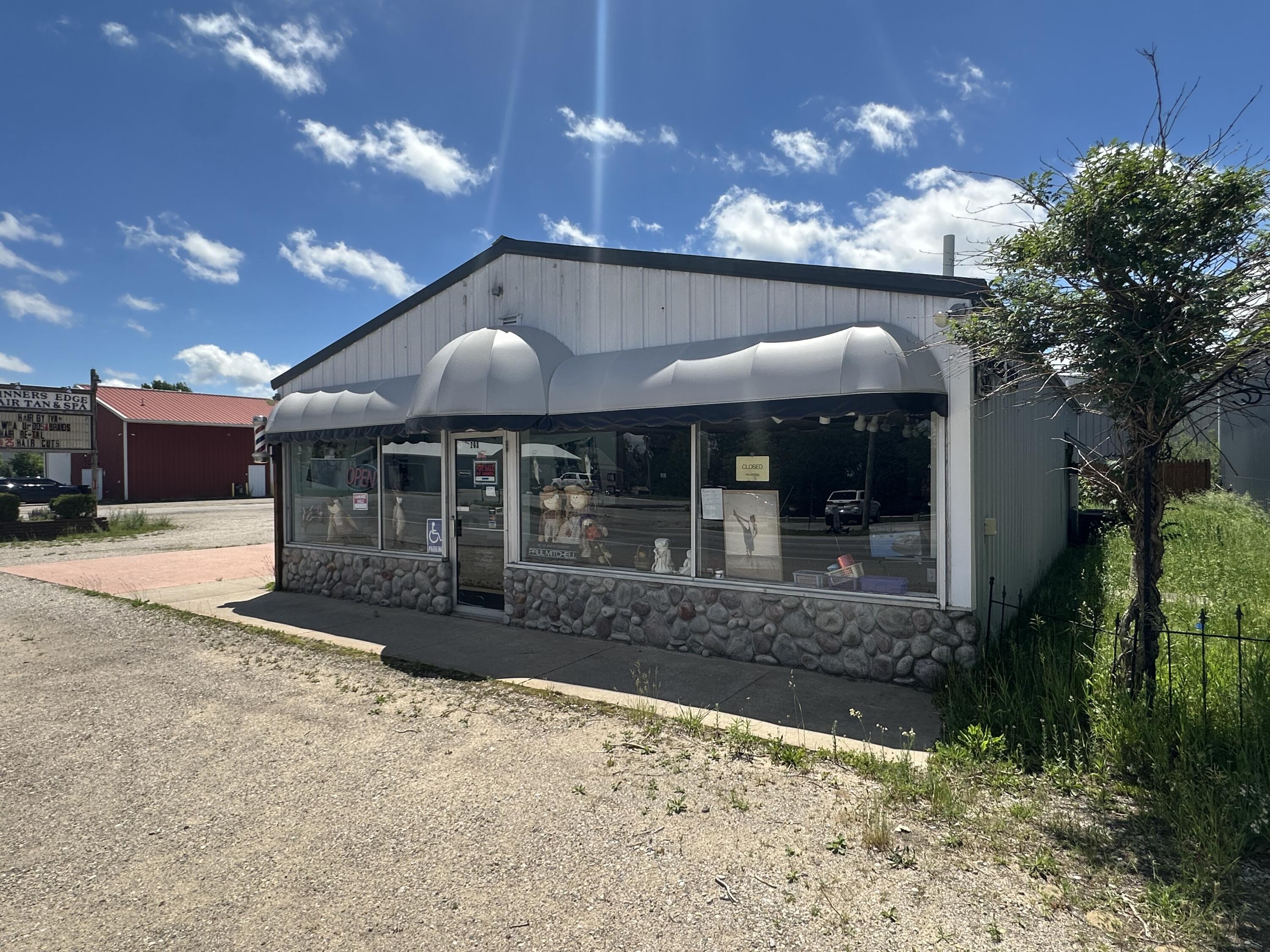 Photo 1 of 31 — 208 Elm Street, Kalkaska, MI 49646