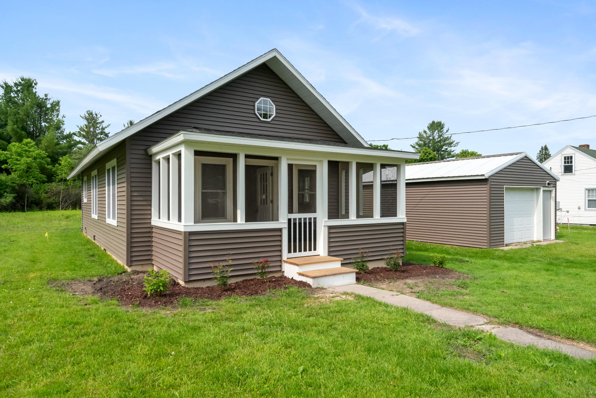 Photo 1 of 22 — 6066 Hemlock Street, Indian River, MI 49749