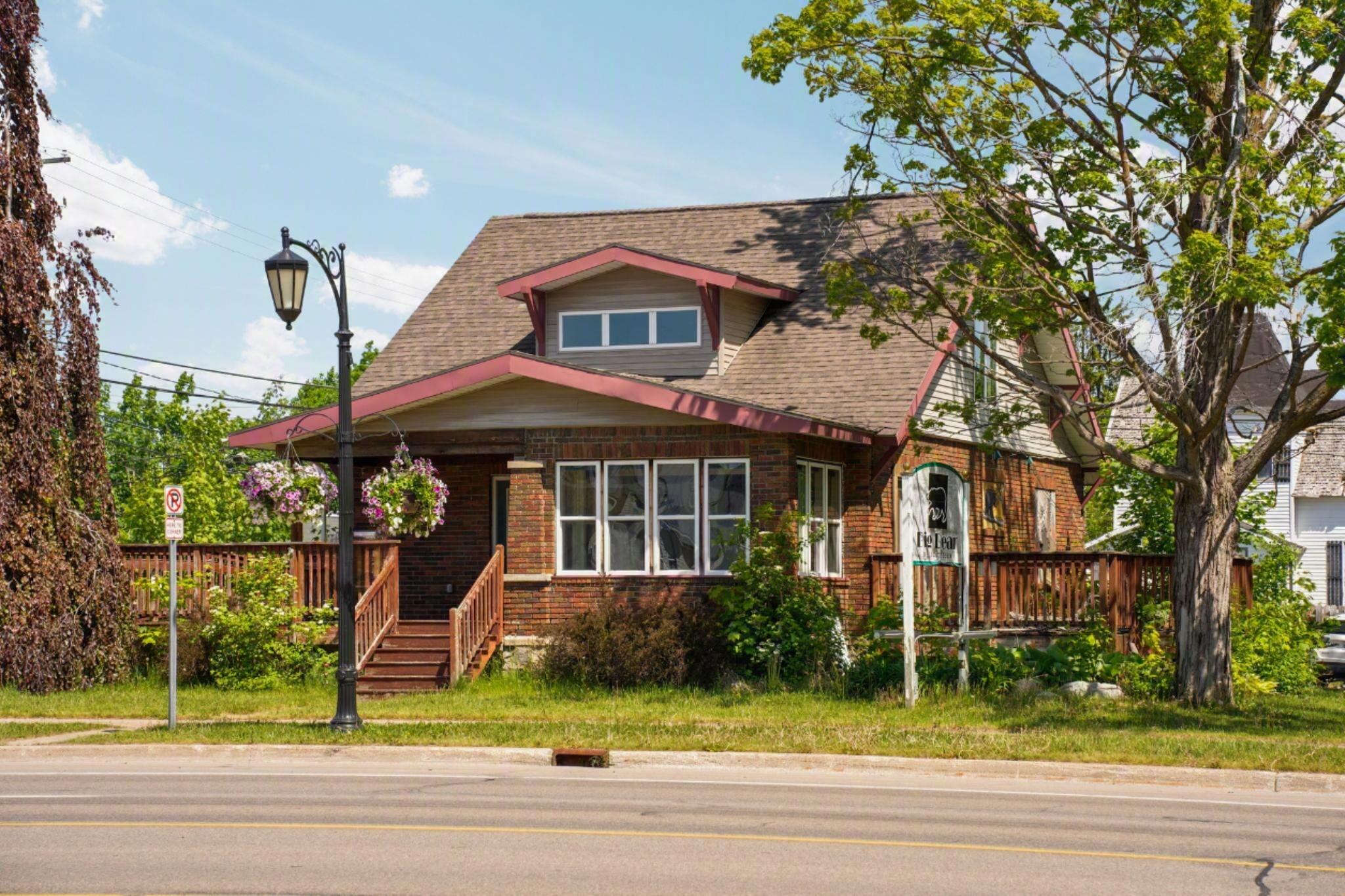 Photo 1 of 57 — 201 E Main Street & 108 N Elm Ave, Gaylord, MI 49735