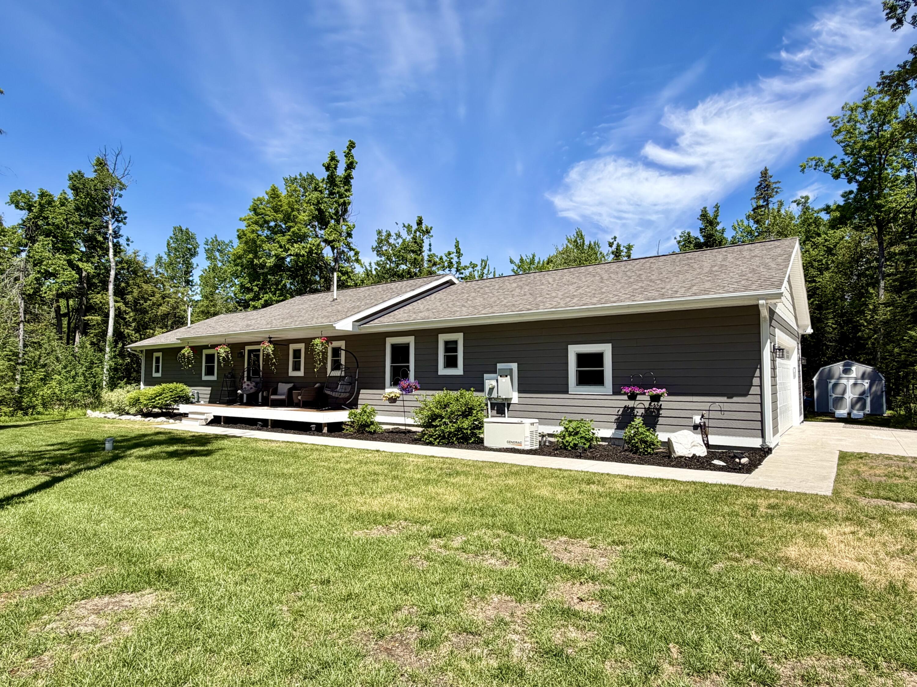 Photo 1 of 38 — 1539 Mullett Lake Woods Road, Cheboygan, MI 49721