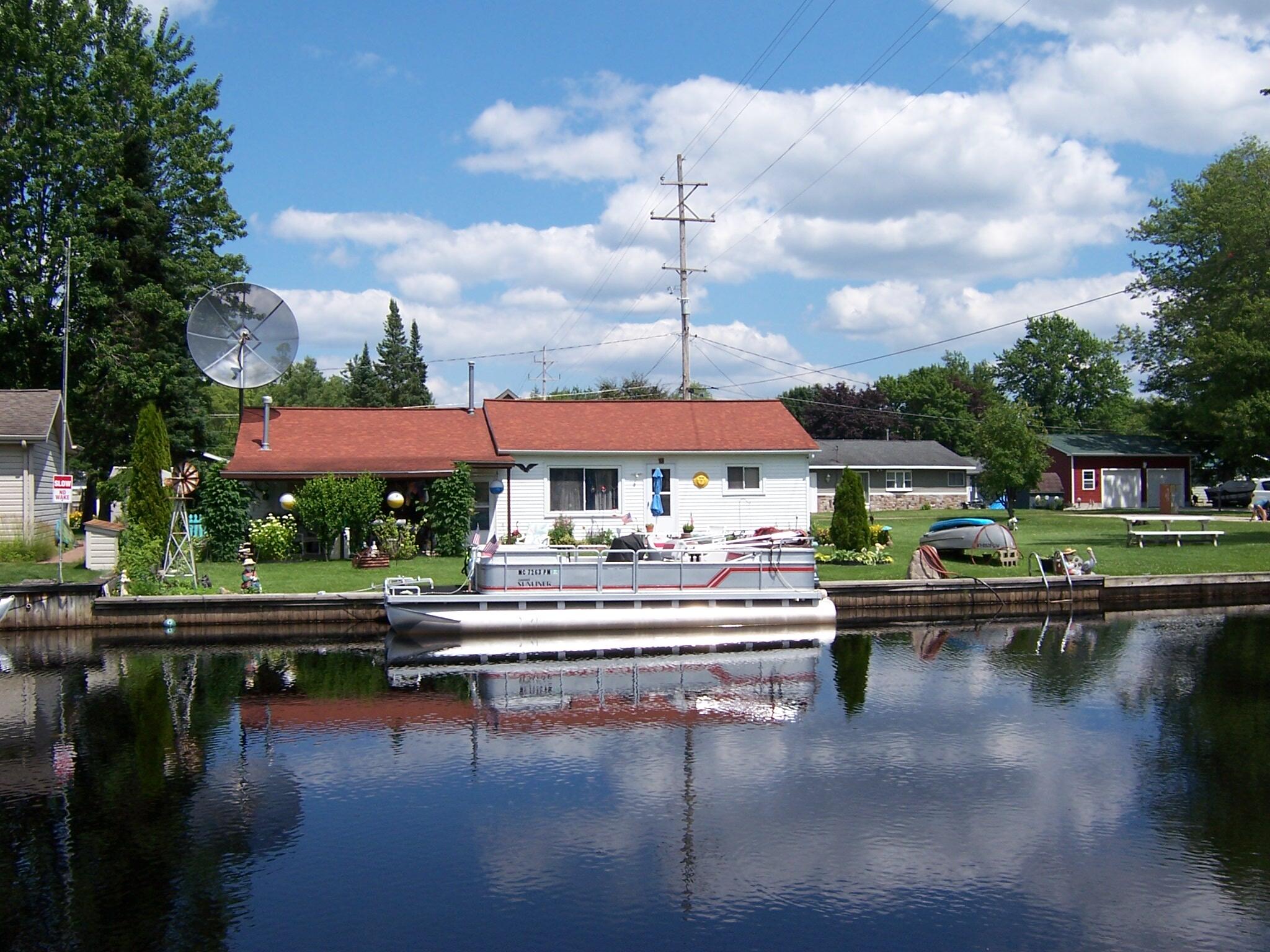 Photo 1 of 27 — 120 Brad N Cris Drive, Houghton Lake, MI 48629