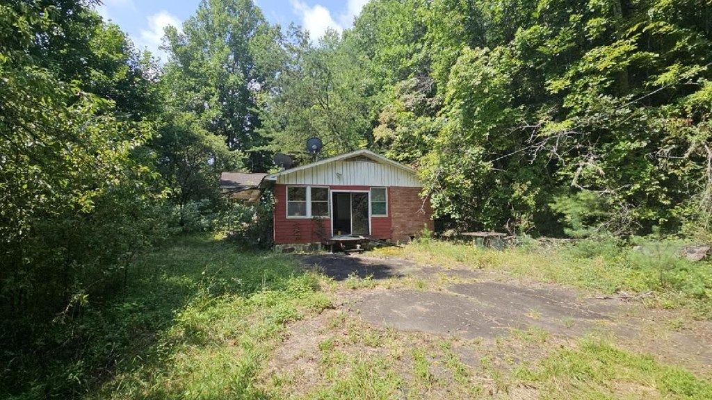 Photo of 91/95 Spring Rd, Bryson City, NC 28713 (MLS # 26037662)
