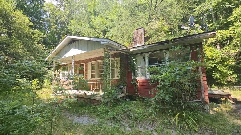 Photo of 91/95 Spring Rd, Bryson City, NC 28713 (MLS # 26037662)