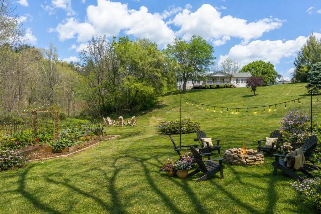 Photo of 71 Bullfrog Cove Rd, Sylva, NC 28779 (MLS # 26046995)