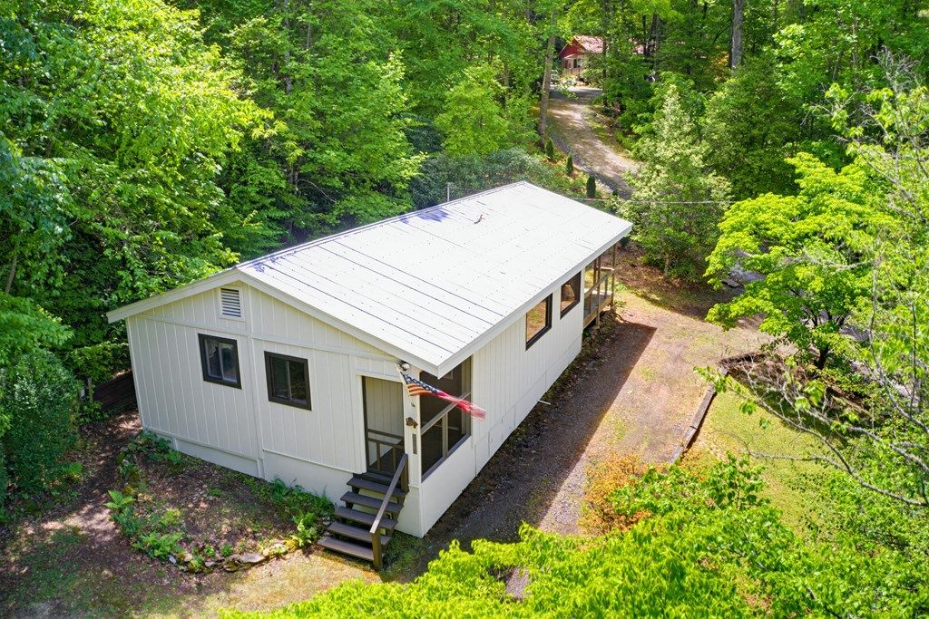 Photo of 223 Little Cove Rd, Sylva, NC 28779 (MLS # 26047215)