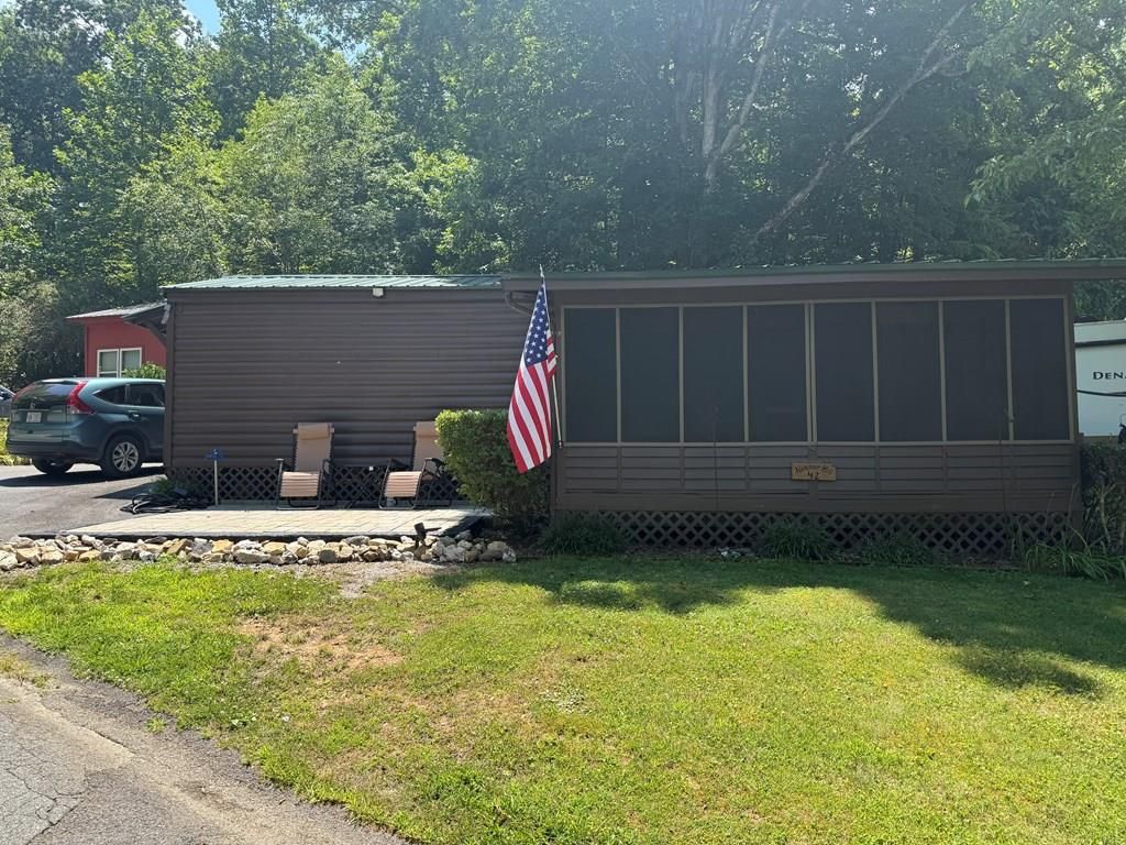 Photo of 42 Hummer Hill, Whittier, NC 28789 (MLS # 26041611)