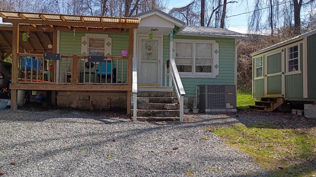 Photo of 588 Franklin Grove Church Road, Bryson City, NC 28713 (MLS # 26046904)