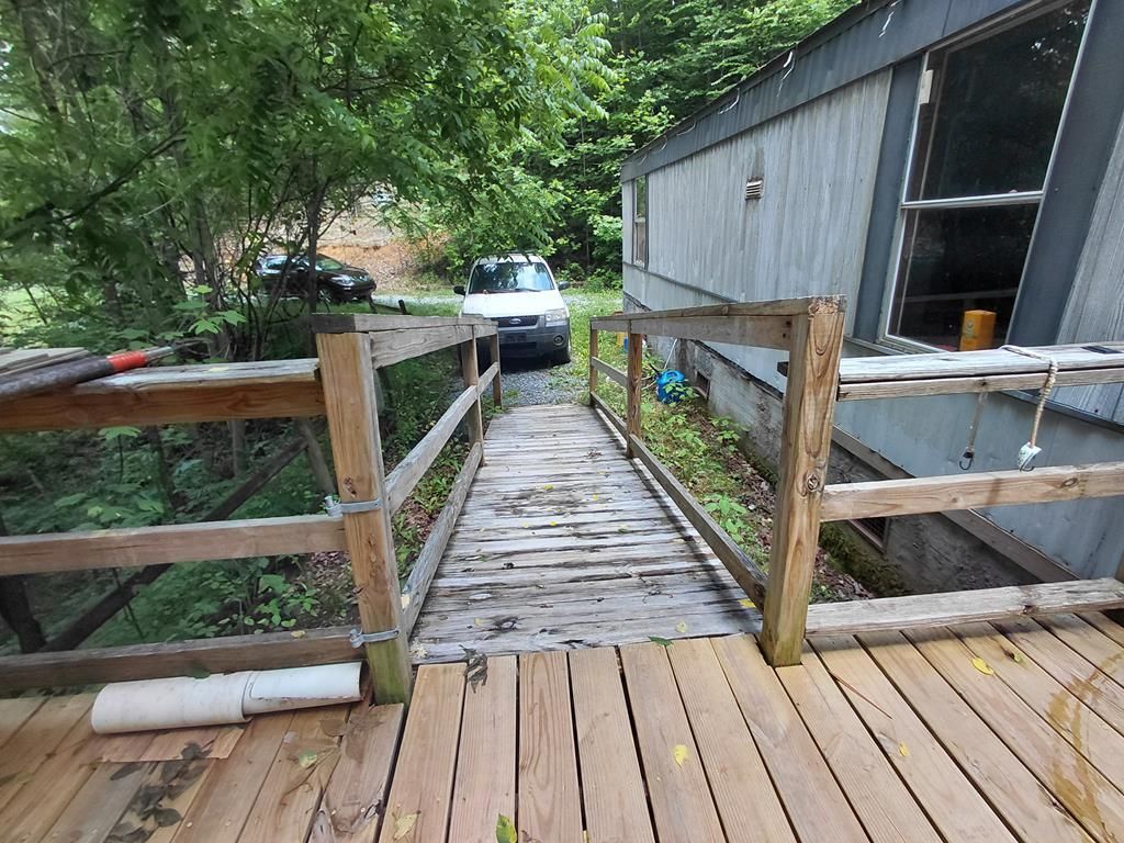 Photo of 220 Mountain Spring Rd, Bryson City, NC 28713 (MLS # 26047358)