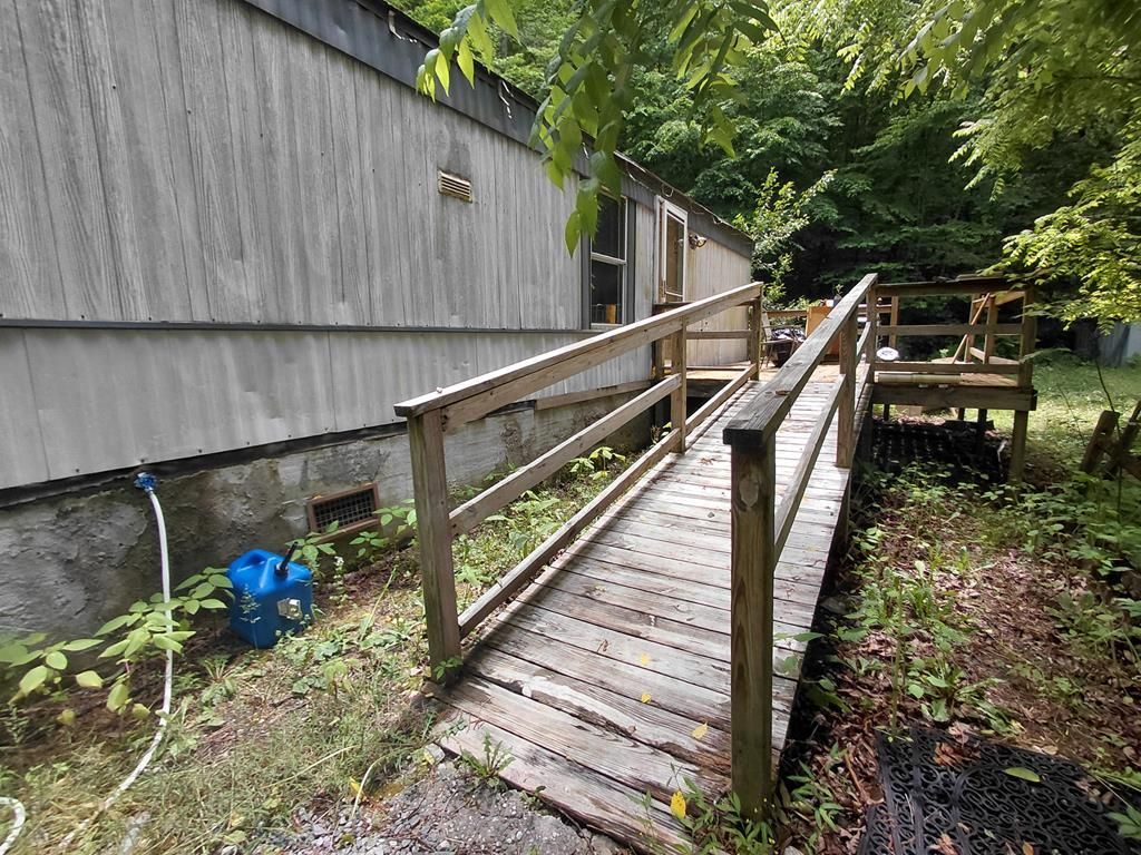 Photo of 220 Mountain Spring Rd, Bryson City, NC 28713 (MLS # 26047358)