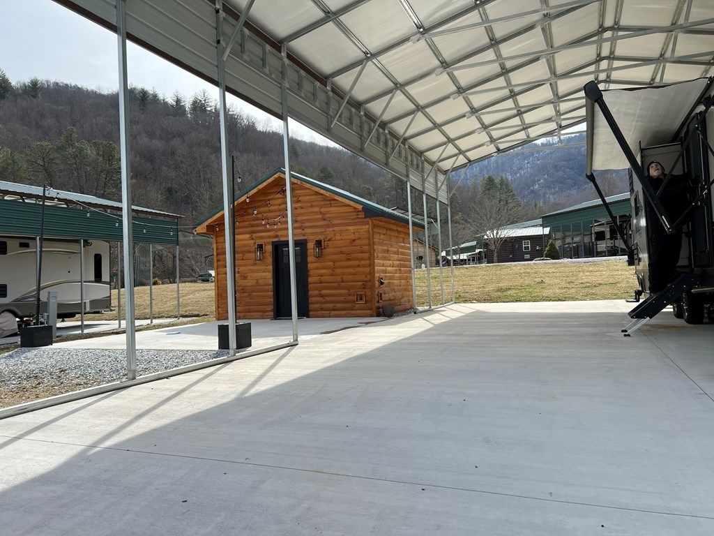 Photo of 415 Hyde Town Rd Lot 24 Rd, Stecoah, NC 28771 (MLS # 26045417)