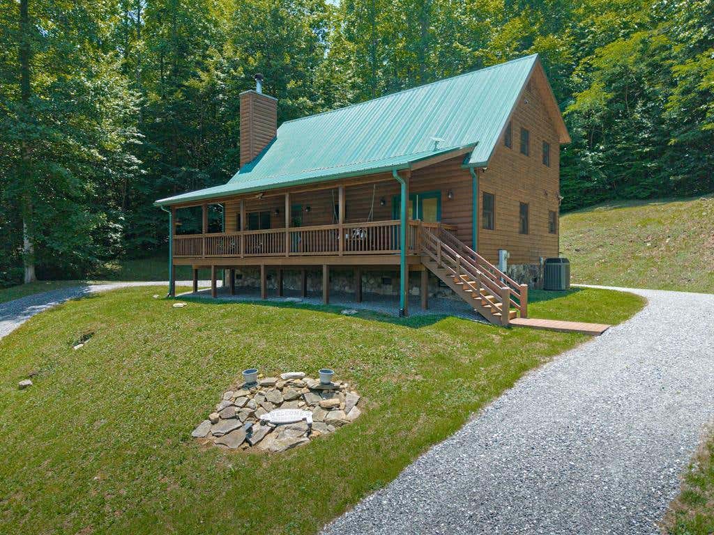 Photo of 59 W Canoe Creek, Tuckasegee, NC 28783 (MLS # 26047740)