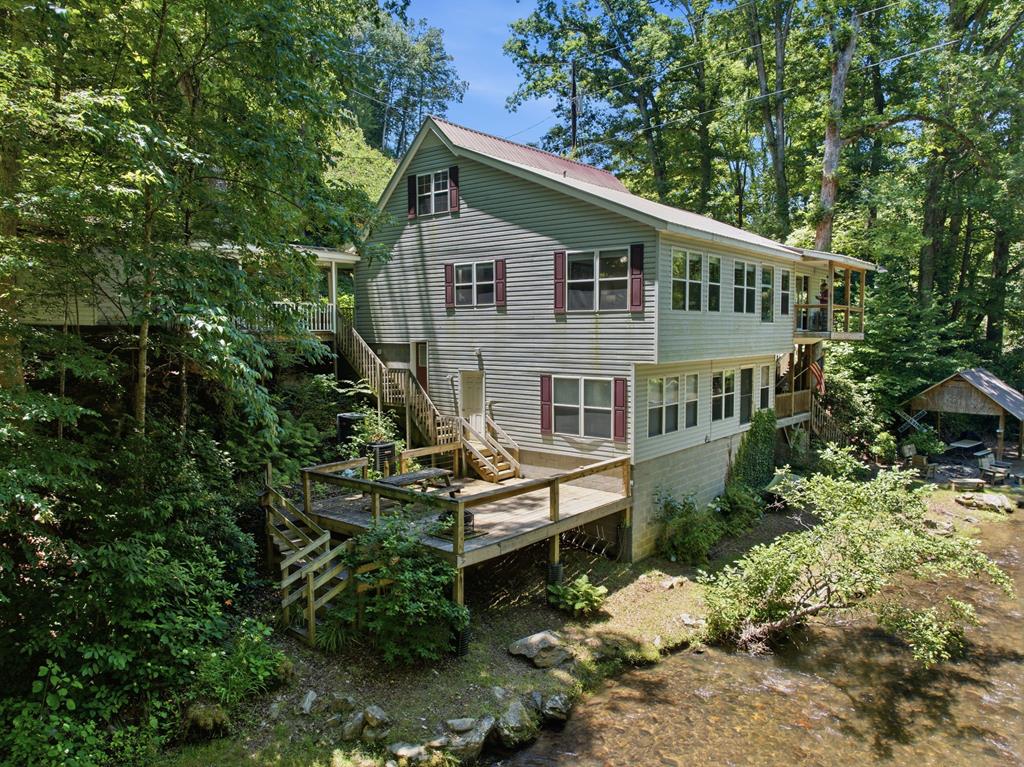 Photo of 10435 Lower Alarka Road, Bryson City, NC 28713 (MLS # 26048669)