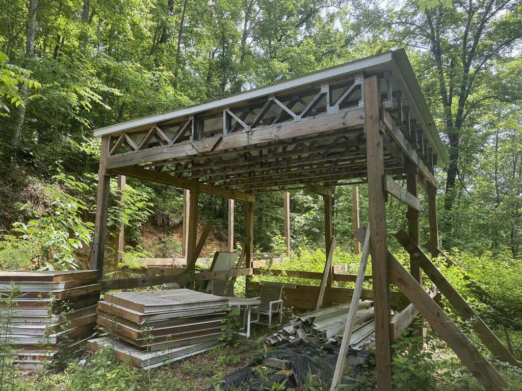 Photo of 394 Eagles Roost Rd, Bryson City, NC 28413 (MLS # 26048175)