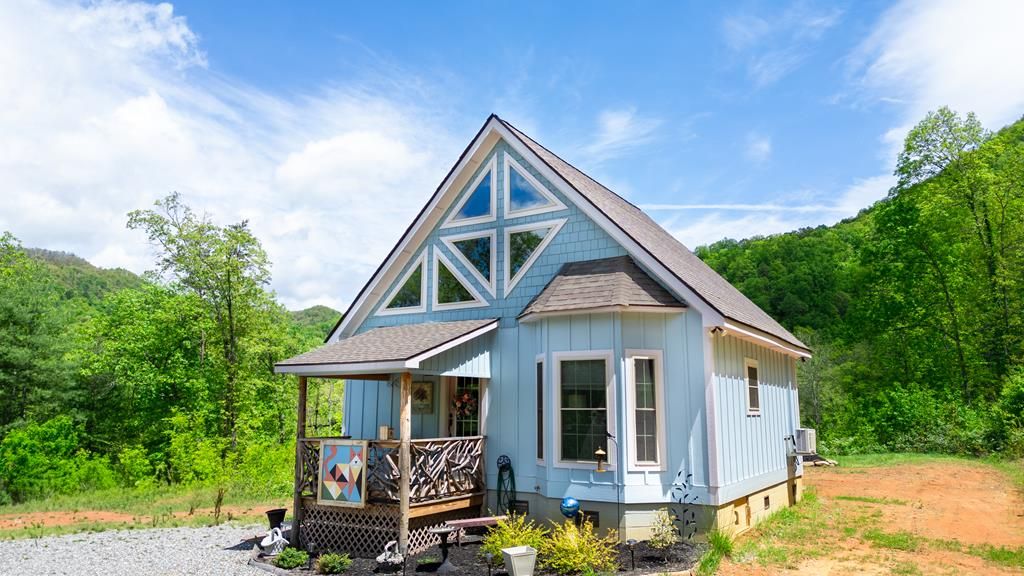 Photo of 720 Cedar Creek Farms Rd, Tuckasegee, NC 28783 (MLS # 26045368)