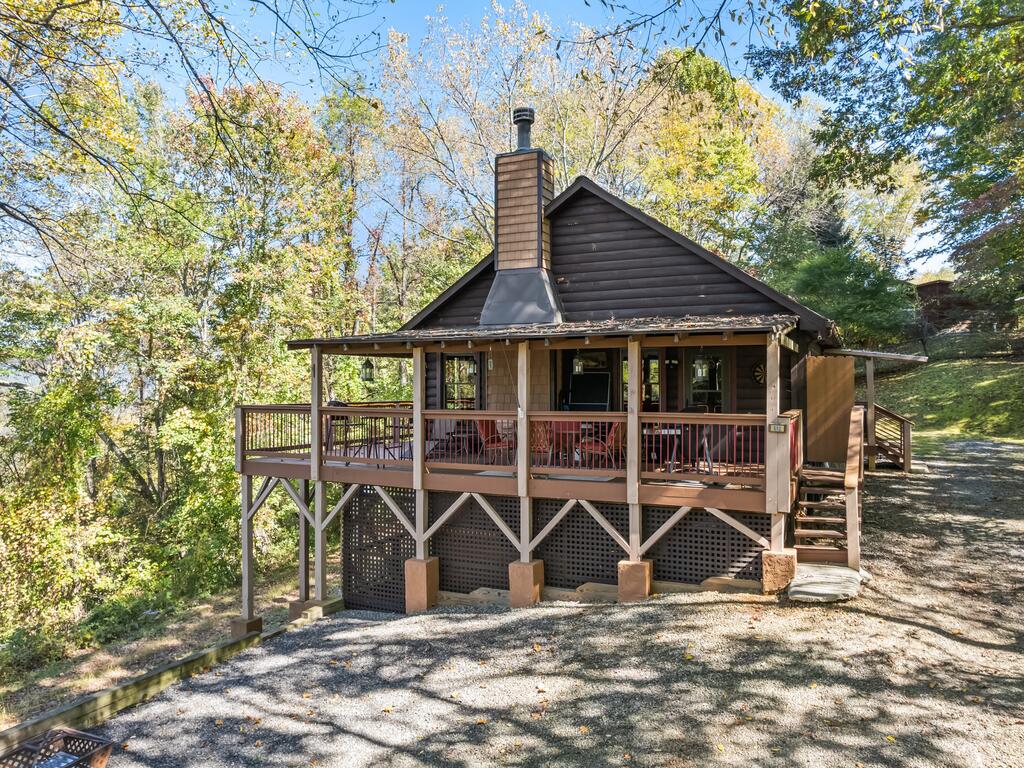 Photo of 612 Whispering Winds Road, Waynesville, NC 28785 (MLS # 26048804)