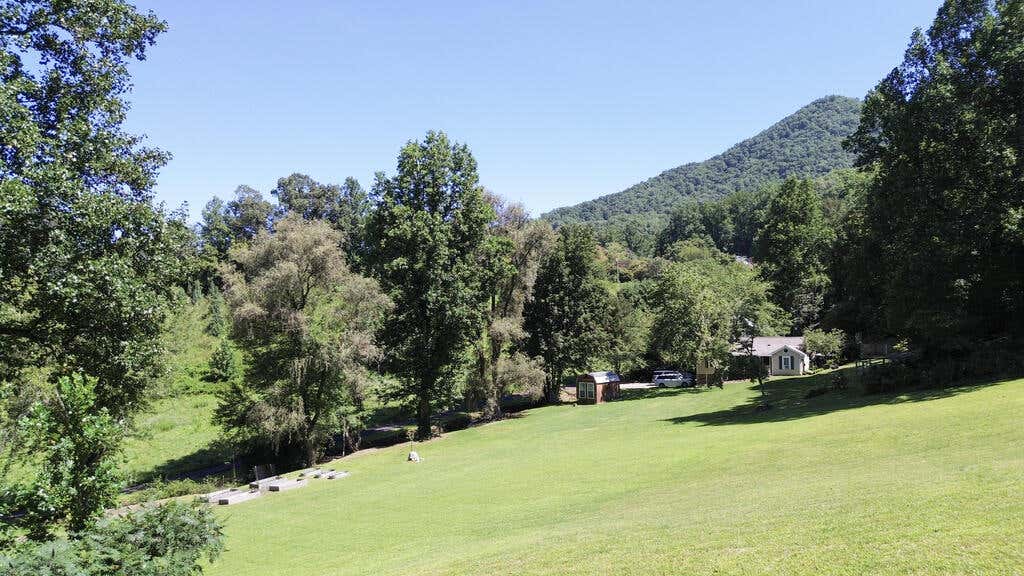 Photo of 68 Wilson Cemetery Road, Cullowhee, NC 28723 (MLS # 26048287)