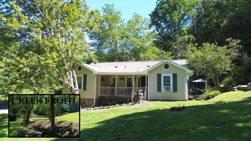 Photo of 68 Wilson Cemetery Road, Cullowhee, NC 28723 (MLS # 26048287)