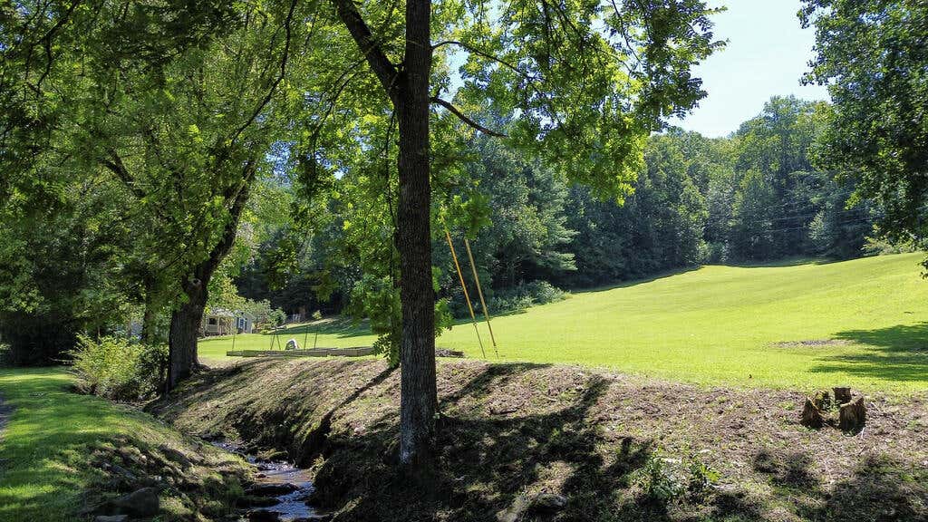 Photo of 68 Wilson Cemetery Road, Cullowhee, NC 28723 (MLS # 26048287)