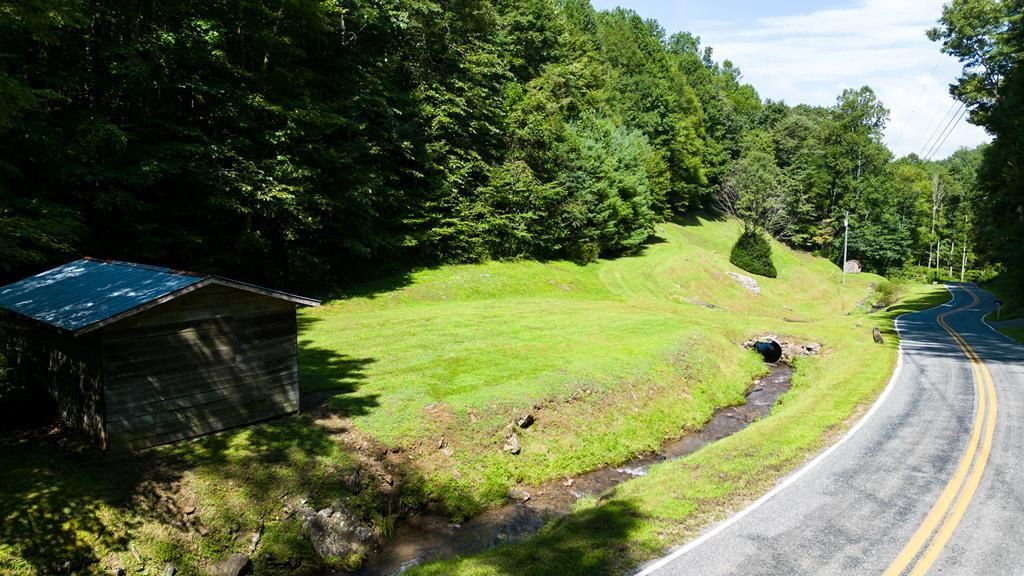 Photo of 3670 Pumpkintown Rd, Sylva, NC 28779 (MLS # 26041959)