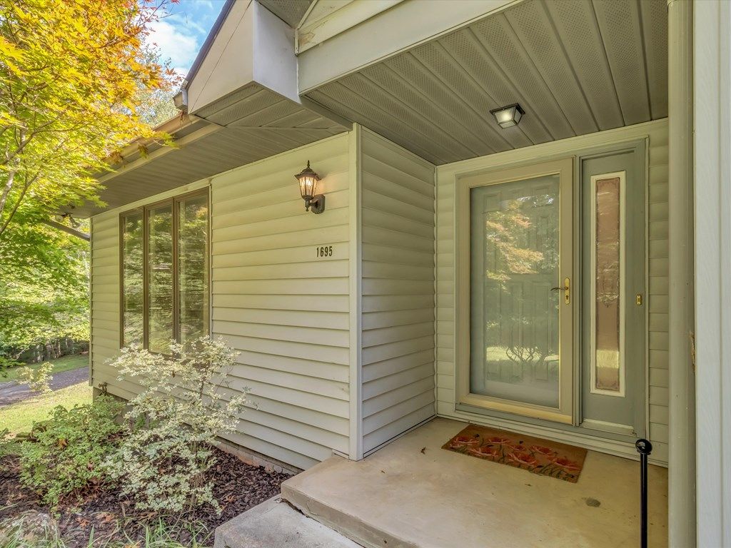 Photo of 1695 Skyland Drive, Sylva, NC 28779 (MLS # 26042118)